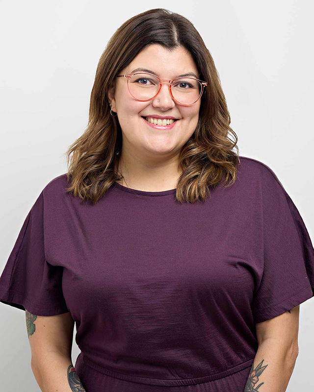 headshot_photography_studio_lowell headshot portrait of a woman with brown hair and glasses